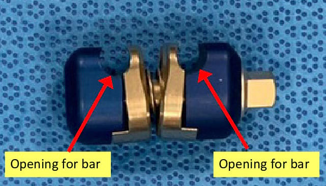 Bar-to-bar clamps attach the angel wings